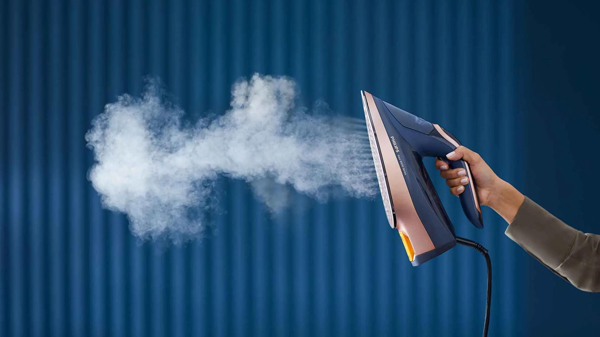 Automatic vertical steam shots for hanging garments