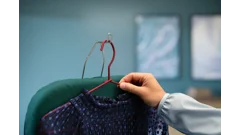 Gancho superior retráctil