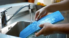 Maak de dweilpad altijd vooraf nat